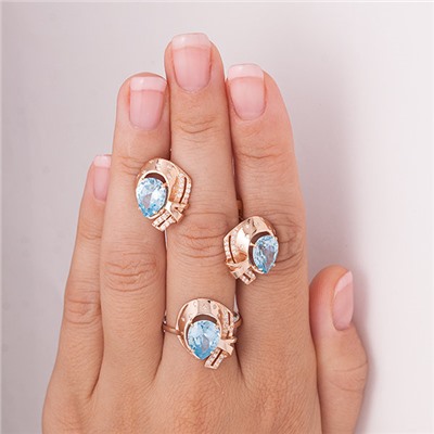 Позолоченное кольцо с фианитом голубого цвета 770 - п