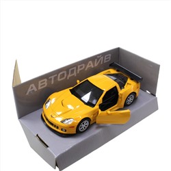 Модель машины Chevrolet Corvette масштаб 1:32 (длинна 12см)  желтого цвета.