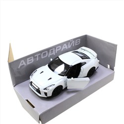 Модель машины Nissan GT-R R35 масштаб 1:32 (длинна 12см)  белого цвета.