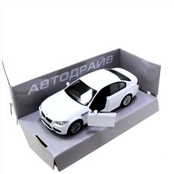 Модель машины BMW M5 Cope масштаб 1:32 (длинна 12см)  белого цвета.